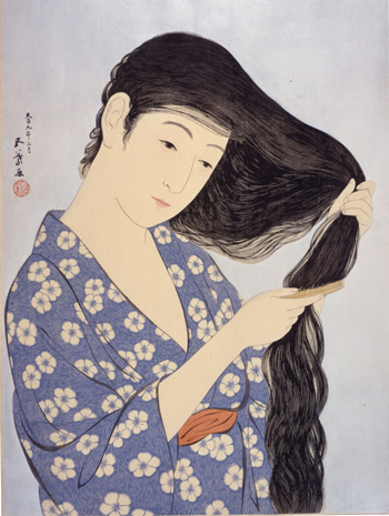 髪梳ける女